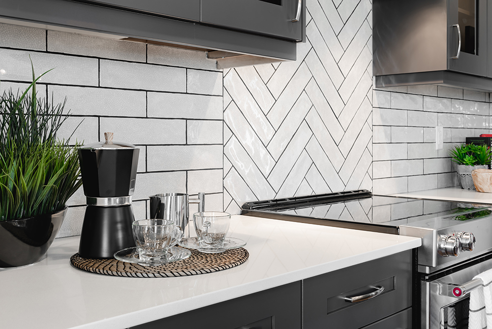 Herringbone tile kitchen backsplash